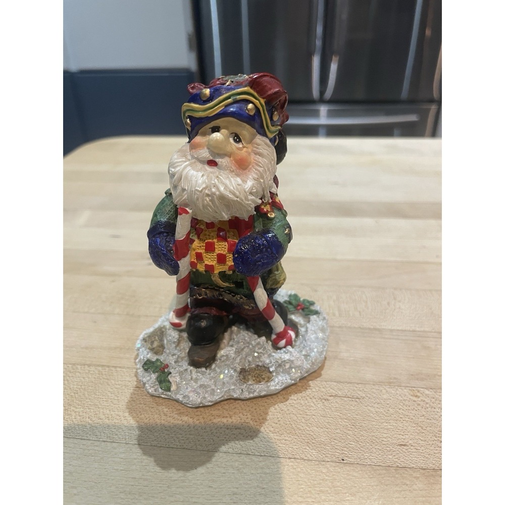 Candy cane Skiing Old World Santa Claus Resin Figurine 4"